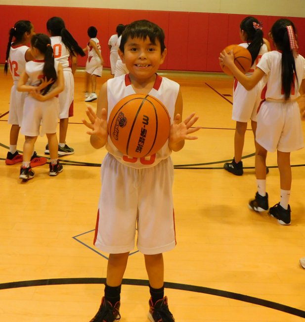 BSDS basketball team warming up for game.