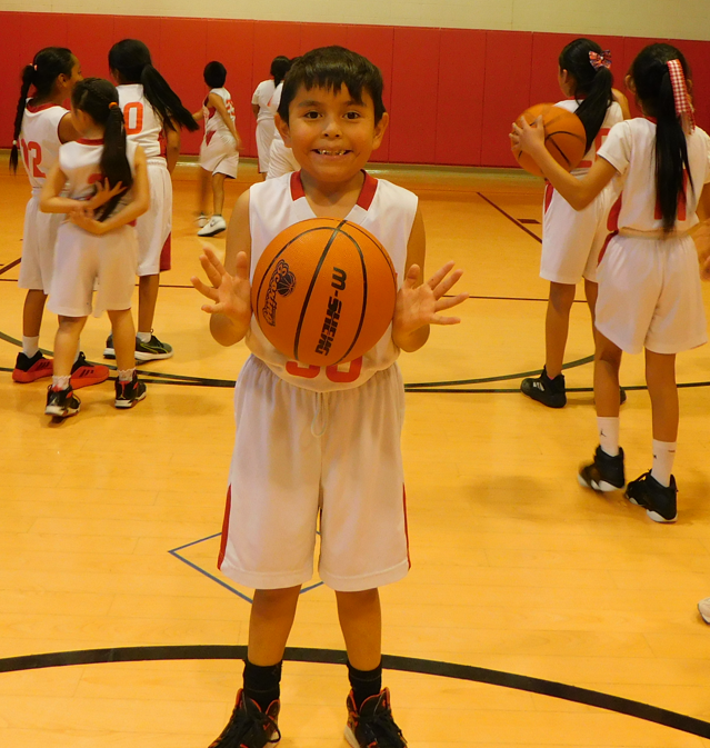 BSDS basketball team warming up for game.